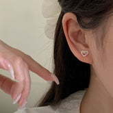 Heart's Whisper · Silver Bow Stud Earrings
